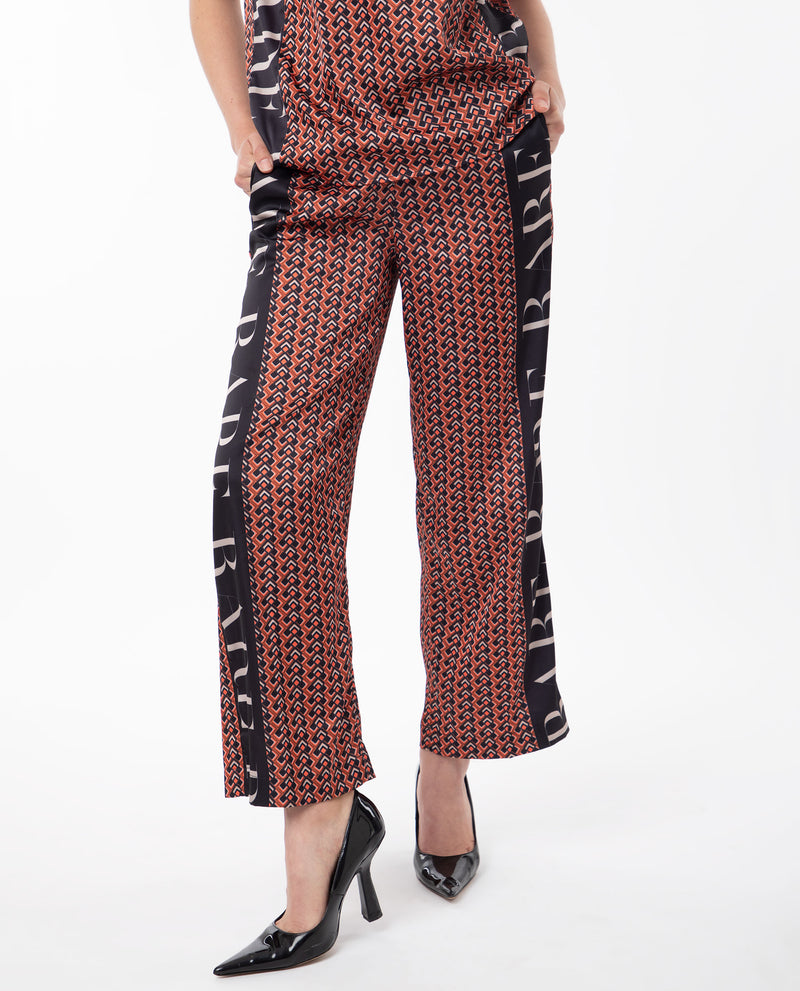Rareism Women'S Streif Orange Polyester Fabric Relaxed Fit Geometric Print Ankle Length Trousers